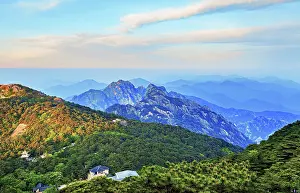 Range Prints: Morning light breaks over the mountains in Huangshan offering a view of peaks and valleys in Anhui Province