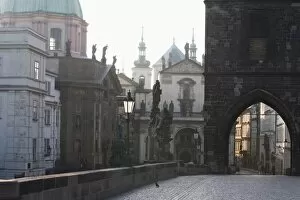 Moody Collection: Morning light, Charles Bridge, Church of St. Francis dome, Old Town Bridge Tower