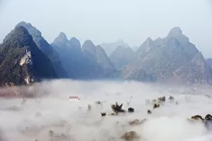 Morning mist covering the valley at Detian Falls, Guangxi Province, China, Asia