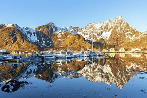 Nordic Prints: Morning view of the marina of Ballstad and reflection of mountains in the calm and frozen water