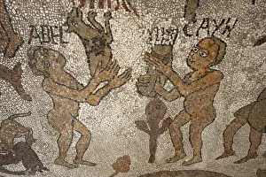 Mosaic of Abel and Cain offering presents to God on the floor of the central nave