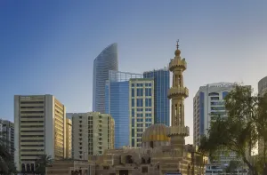 Contrasts Prints: Mosque and modern buildings downtown Abu Dhabi, United Arab Emirates, Middle East