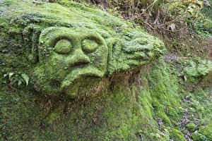 Religious Site Prints: Moss covered sculptures in the forest