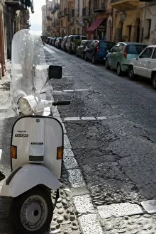 Sicily Gallery: Motor scooter parked on street