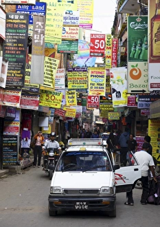 Thamel Prints: Motorbikes and cars in streets of Thamel, Kathmandu, Nepal, Asia