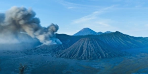 Mount Bromo volcano erupting before sunrise, East Java, Indonesia, Southeast Asia, Asia
