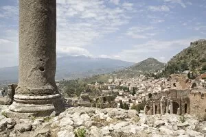 Mount Etna viewed from the Greek and Roman theatre, Taormina, Sicily, Italy, Europe
