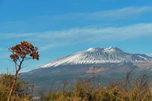 Mount Etna Prints: Mount Etna volcano covered with snow on a clear and sunny day