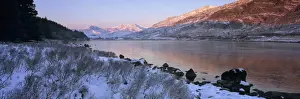 Mount Snowdon Prints: Mount Snowdon in snow at sunrise with frozen LLynnau Mymbyr lake, Capel Curig
