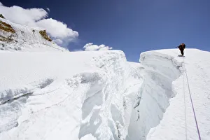 Rope Prints: Mountain guide traversing a crevasse, Island Peak, 6189m, Solu Khumbu Everest Region