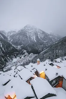 Valtellina Prints: Mountain huts covered with snow in the alpine village of Starleggia, Campodolcino