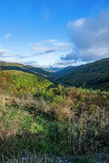 Fresh Prints: Mountain landscape in the Republic of South Ossetia with green hills and blue sky during daytime
