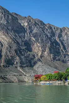 Retreat Prints: Mountain lodge on the river in the mountains of Dagestan, Russia at midday