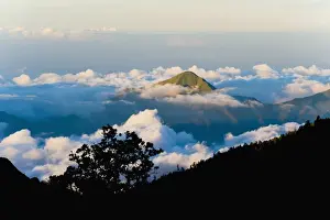 Lombok Prints: Mountain peaks rising high above the clouds taken from Mount Rinjani volcano