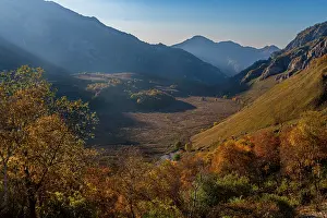 Season Prints: Mountain scenery in Chechnya with autumn colors and sunlight in the Caucasus region of Russia