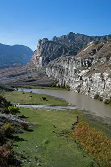 Fresh Prints: Mountain scenery along the Karakoisu river with cliffs and green areas in Dagestan, Russia