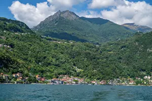 Retreat Prints: Mountain scenery and lakeside towns along Lake Como in Italy with clear skies and water views
