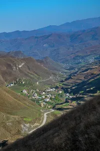 Dirt Prints: Mountain valley near Kubachi shows rural landscape and winding roads in Dagestan