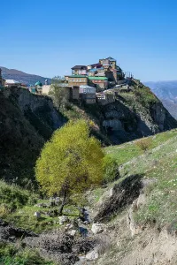 Living Prints: Mountain village on a hillside with homes and trees in Dagestan