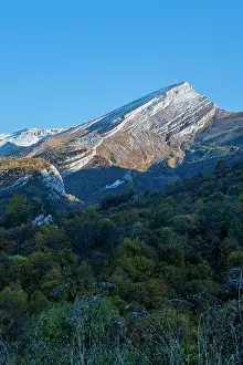 National Prints: Mountains rise in the distance under clear blue sky in Chechnya Caucasus region of Russia