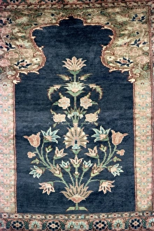 Mughal Prints: Mughal floral pattern woven in rug