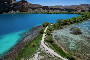 Ecosystems Prints: Multi coloured lakes surrounded by mountains and greenery in Afghanistan's national park