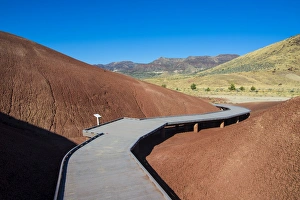 Dust Gallery: Multicoloured strata hill in the Painted Hills unit in the John Day Fossil Beds National Monument