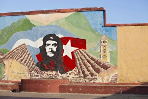 Mural of Che Guevara painted on a wall in a local school, Trinidad, Cuba