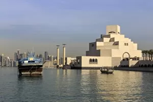 Contrast Collection: Museum of Islamic Art, dhow and modern city skyline of West Bay, from Al-Corniche
