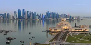 Qatar Prints: Museum of Islamic Art with West Bay skyscrapers in background, Doha, Qatar, Middle East