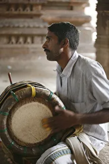 Musicians Prints: Musician calling for the puja, Trivalenjury temple, Tamil Nadu, India, Asia