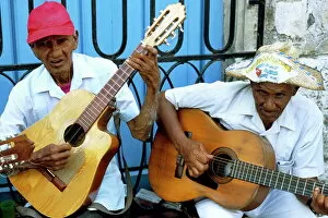 Images Dated 27th July 2008: Musicians playing guitars, Havana Viejo, Havana, Cuba, West Indies, Central America