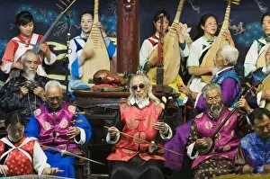 Musicians in a traditional Naxi orchestra, Lijiang Old Town, UNESCO World Heritage Site