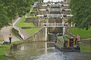 Canal Collection: Narrow boat entering the bottom lock of the five lock ladder on the Liverpool Leeds canal