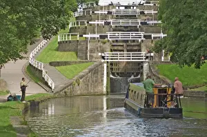 Canal Prints: Narrow boat entering the bottom lock of the five lock ladder on the Liverpool Leeds canal