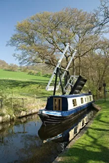 Canal Collection: Narrow boat passing through a lift bridge, Llangollen Canal, Wales, United Kingdom