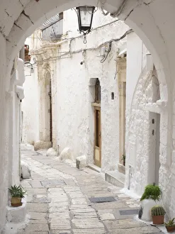 Old Towns Prints: Narrow street in the Old Town, Ostuni, Puglia, Italy, Europe