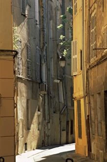 Images Dated 24th January 2000: Narrow sunlit street in Old Aix, Aix-en-Provence, Bouches-de-Rhone, Provence-Alpes-Cote-d Azur