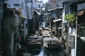 Anchor Prints: Narrow waterway between houses