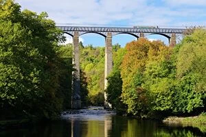 Rural Scenes Gallery: Narrowboat crossing the River Dee in autumn on the Pontcysyllte Aqueduct, built by Thomas Telford