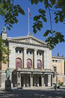 Famous People Prints: The National Theatre and Henryk Ibsens sculpture, Oslo, Norway, Scandinavia, Europe