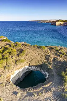 Salento Prints: Natural stone arch and open grotto framed by turquoise sea, Otranto, Lecce province