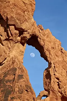 View Through Prints: Near-full moon rising through an arch