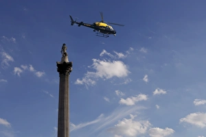 Trafalgar Square Prints: Nelsons Column and police helicopter, London, England, United Kingdom, Europe