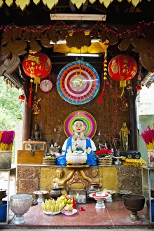 Typically Prints: Neon Buddhist display in a Buddhist temple in Phnom Penh