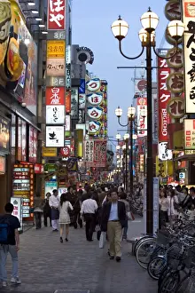 Entertainment District Prints: Neon signs bring Dotonbori entertainment district to life after sunset, Osaka, Japan