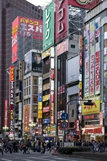 Neon signs light up the Kabukicho entertainment district in Shinjuku, Tokyo, Japan, Asia
