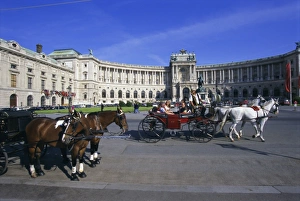 Pulling Prints: Neue Hofburg and fiaker (horse drawn carriages), Vienna, Austria, Europe