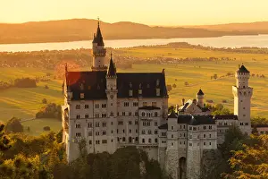 Neuschwanstein Castle at sunset, view to Forggensee Lake, Schwangau, Allgau, Schwaben