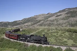 New Mexico and Colorado, Cumbres and Toltec Scenic Railroad, National Historic Landmark, narrow guage, steam powered locomotives, with tourist cars, United States of America, North America